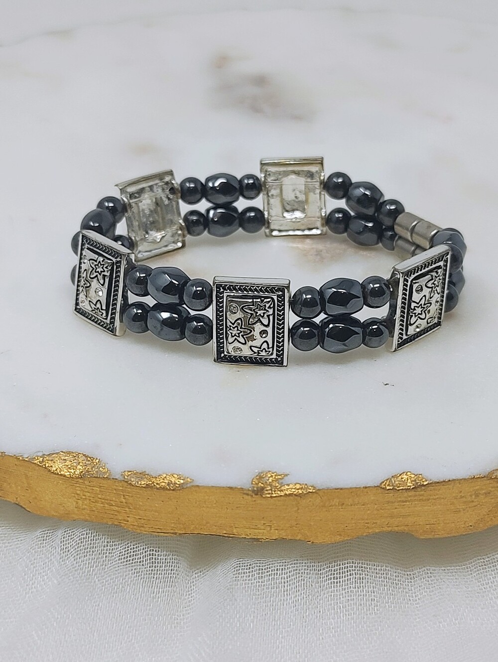 Hematite Beaded Stretch Bracelet with Silver Tone Accent Panels